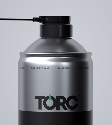 Close-up of lubricant spray head with precision straw, in metallic packaging — packaging design by pecora nera design studio
